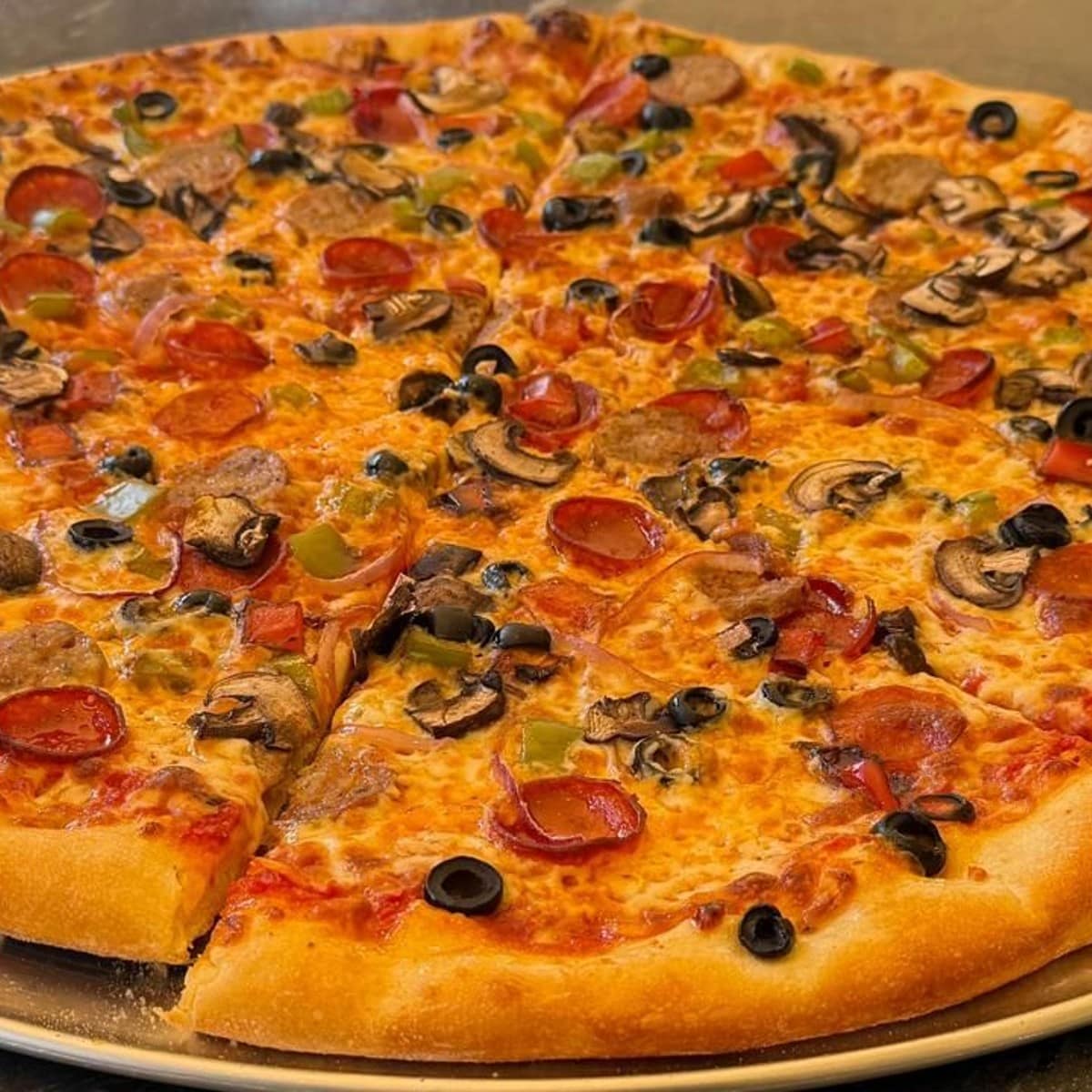 Supreme pizza at Tuscan Cove